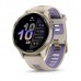 Смарт-годинник Garmin Forerunner 970 із золотистим титановим безелем, сірим корпусом і ремінцем кольору французький сірий/індиго